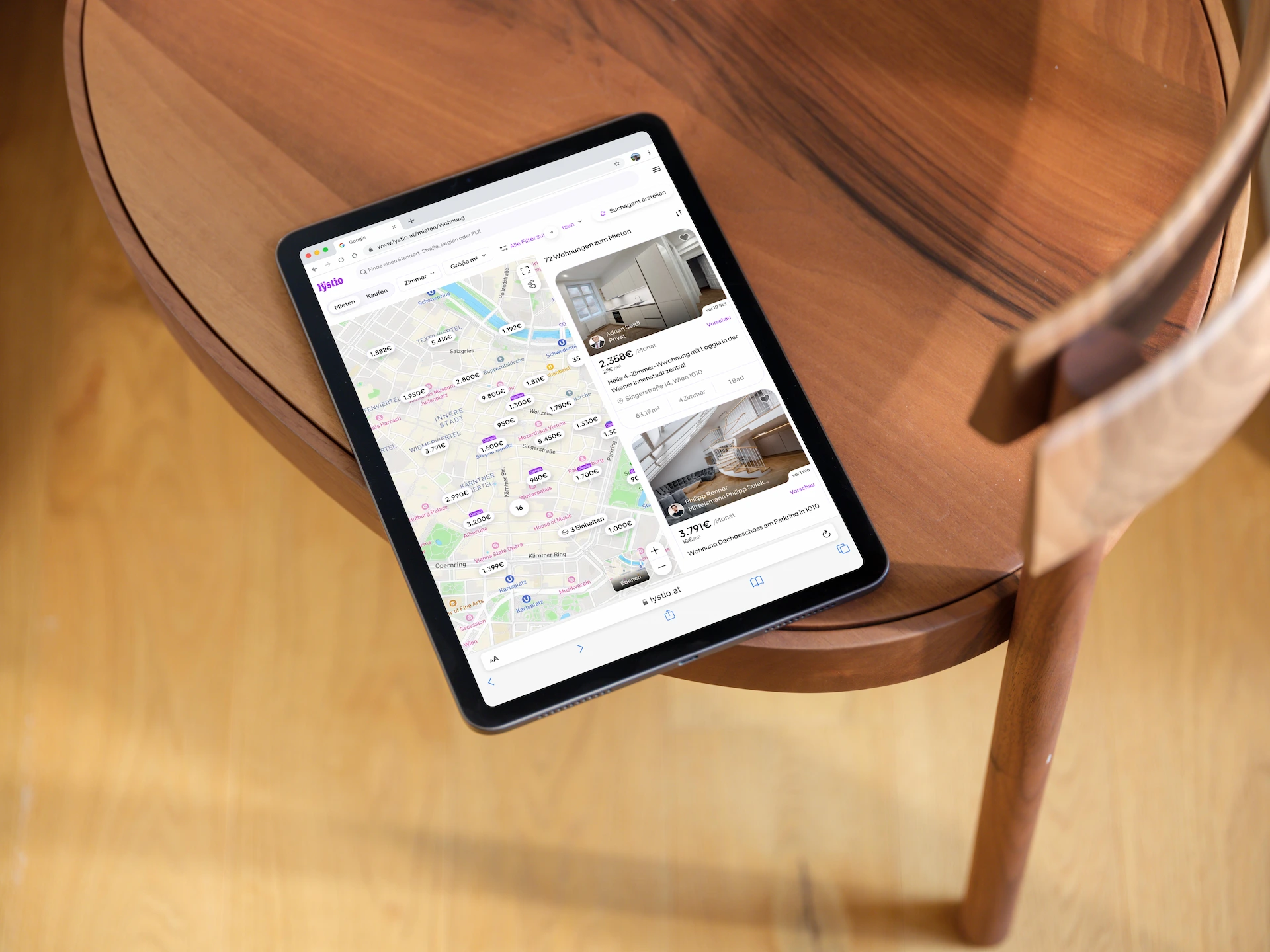 A Lystio listing open on a tablet during a property tour